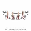 Digital illustration of the letters X and O in red on square white tags, clipped to a horizontal black string with tan clothespins and black bows on the ends.